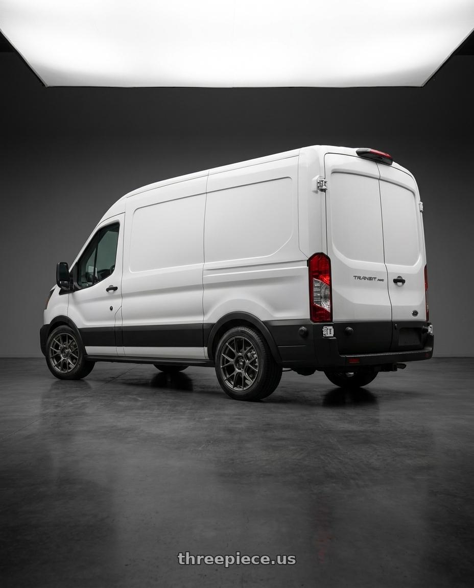 2023 Ford Transit Awd with Konig Ampliform 5x108 18x8.5+43 Dark Metallic Graphite wheels rear three quarter view square tires