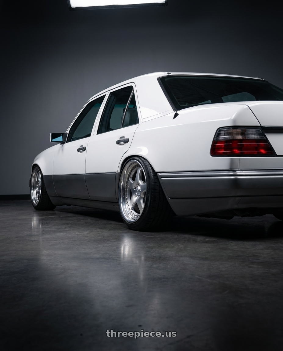 1995 Mercedes E320 with CCW LM5T 4x100 17x9.5 +0 Polished wheels rear three quarter view slight stretch tires