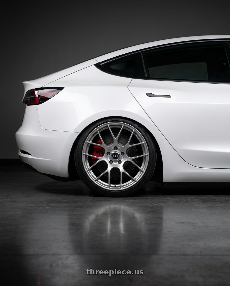 2018 Tesla Model 3 with Enkei Raijin 5x114.3 19x8.5+35 Hyper Silver wheels rear three quarter view slight stretch tires
