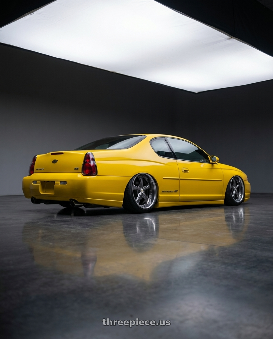 2004 Monte Carlo SS with Work Wheels VS-KF 5X114.3 19x7.5+34 Brilliant Silver Black A Disk FULL REVERSE wheels rear three quarter view slight stretch tires