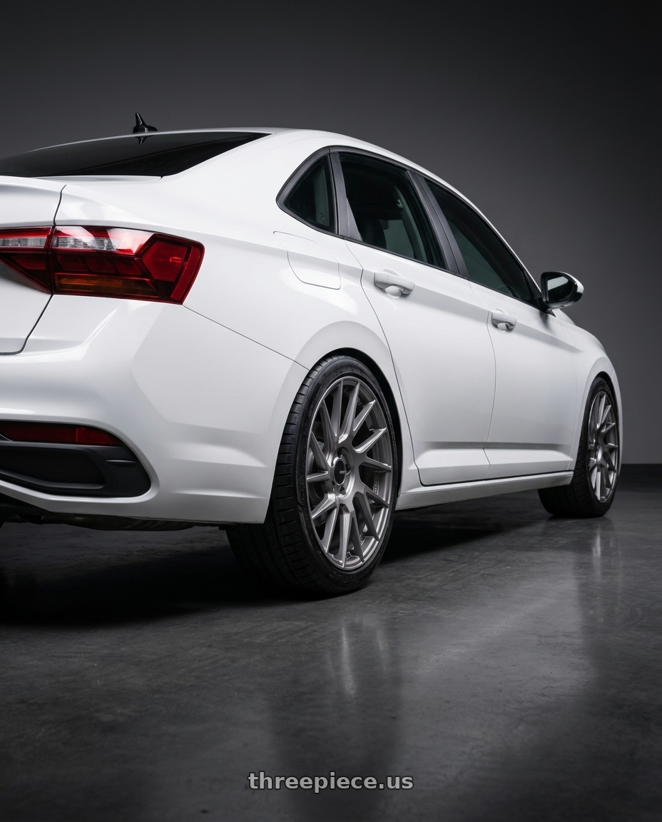 2026 vw jetta with Enkei TM7 5x112 18x8.0+45 Storm Grey wheels rear three quarter view square tires