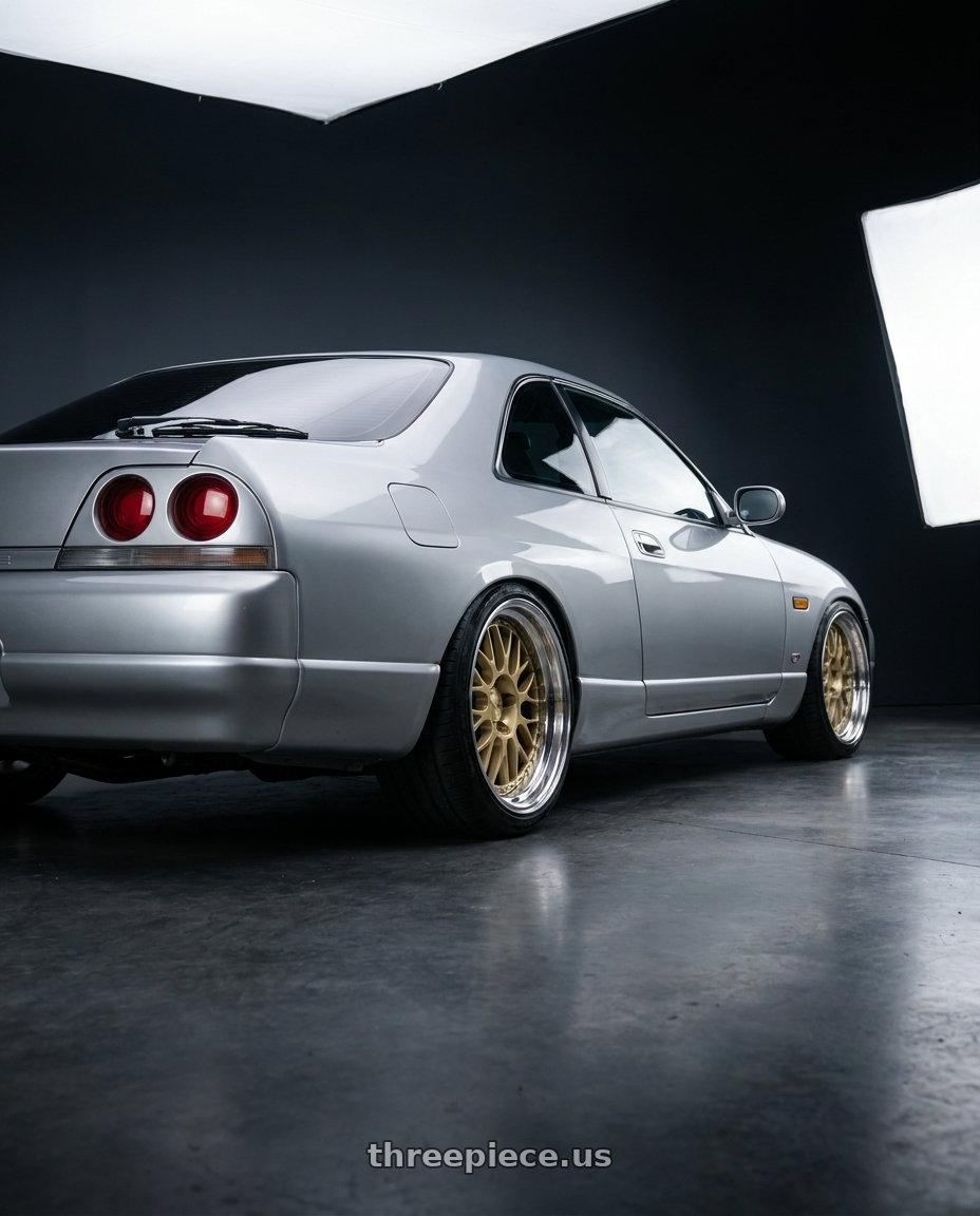 1993 nissan skyline gts25t with Work Brombacher Mesh wheels rear three quarter view slight stretch tires