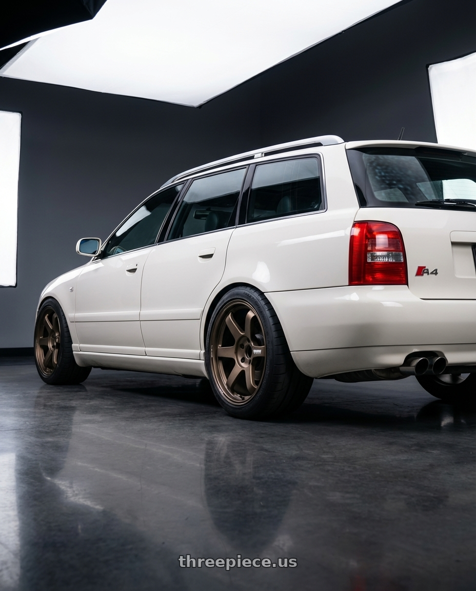 2001 Audi A4 Avant with Volk Racing TE37 Ultra M Spec 5x112 19x9.5+23 19x10.5+35 Bronze Almite Toyota Supra MK5 Spec wheels rear three quarter view meaty tires