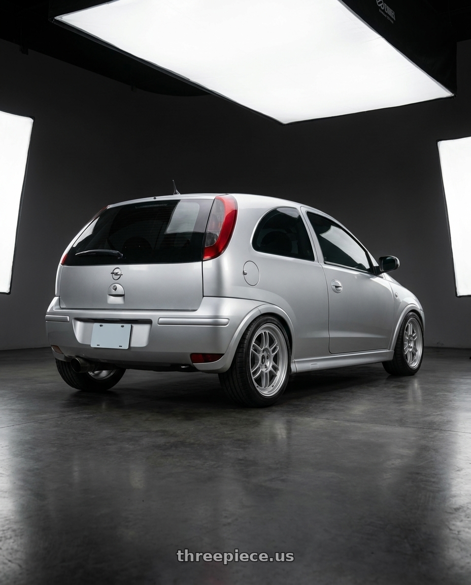 2005 OPEL Corsa C gsi with Enkei RPF1 4x100 16x8+38 Silver wheels rear three quarter view square tires