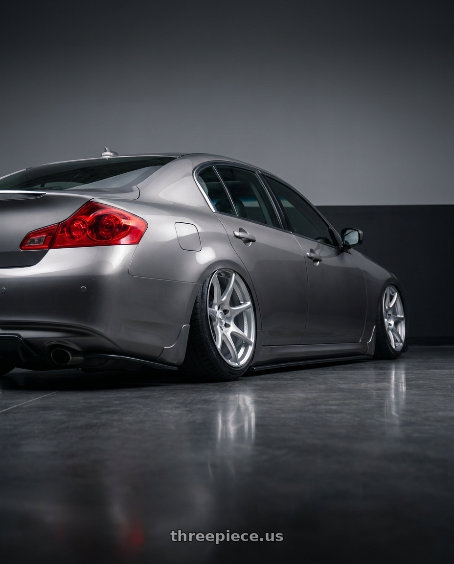 2007 Infiniti G35s with Kansei K11S Tandem 5x114.3 18x8.5 35 Hyper Silver wheels rear three quarter view slight stretch tires