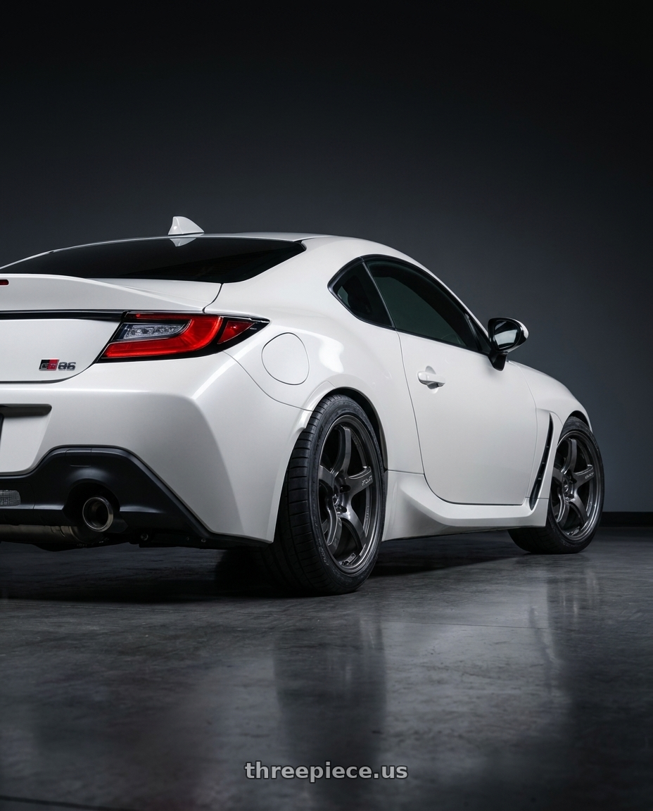 2026 Toyota gr86 with Gram Lights 57CR 5x100 18x8.5 +45 HS GUNMETALLIC wheels rear three quarter view square tires