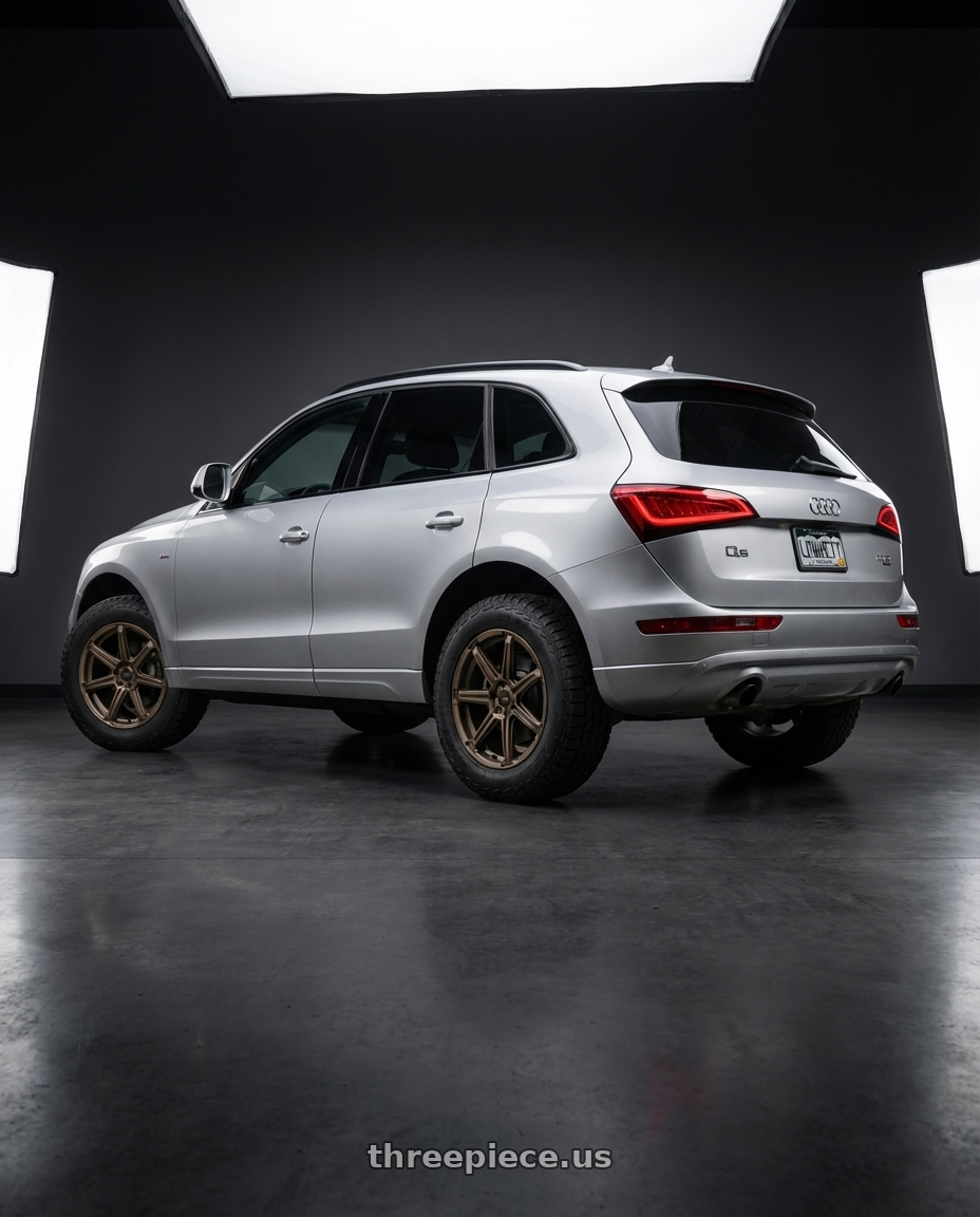 2014 Audi Q5 with Enkei Adventurer 5x108 17x7.5+35 Matte Bronze wheels rear three quarter view meaty tires