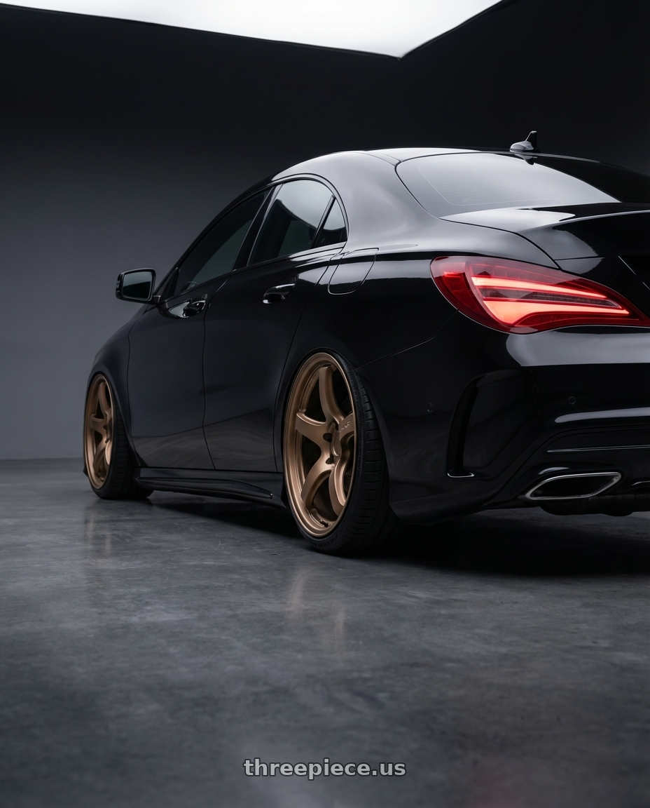 2018 Mercedes-Benz CLA C117 with Gram Lights 57CR 5x112 19x9.5+25 Bronze II wheels rear three quarter view slight stretch tires