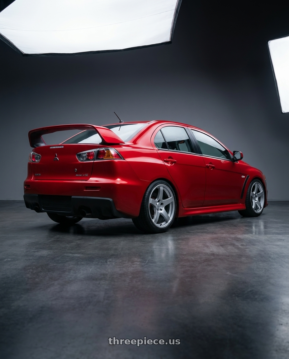 2012 Mitsubishi Lancer Evo X with Ssr Gtv01 5x114.3 18x10.5+15  GLARE SILVER wheels rear three quarter view square tires