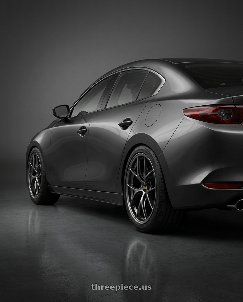 2024 Mazda3 Sedan with BBS RI-D 5x108 19x9 +28 Diamond Black wheels rear three quarter view slight stretch tires