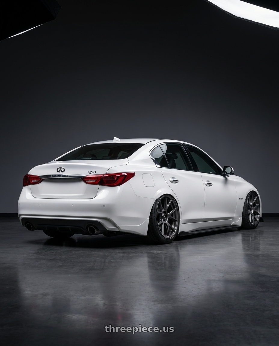 2020 Infiniti Q50 with Konig Ampliform 5x114.3 20x8.5+43 Dark Metallic Graphite wheels rear three quarter view slight stretch tires
