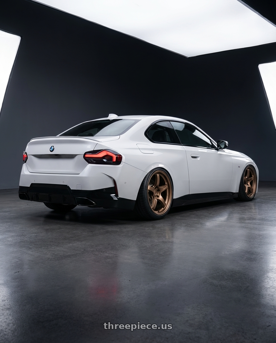 2024 BMW 2 Series G42 with Gram Lights 57CR 5x112 19x9.5+25 Bronze II wheels rear three quarter view slight stretch tires