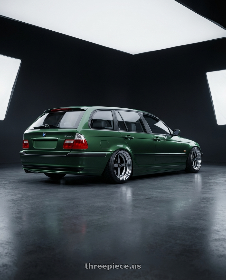 2000 BMW 323i touring Fern Green with Equip 01 Black Polish 4x100 15x13 -16 wheels rear three quarter view extreme stretch tires