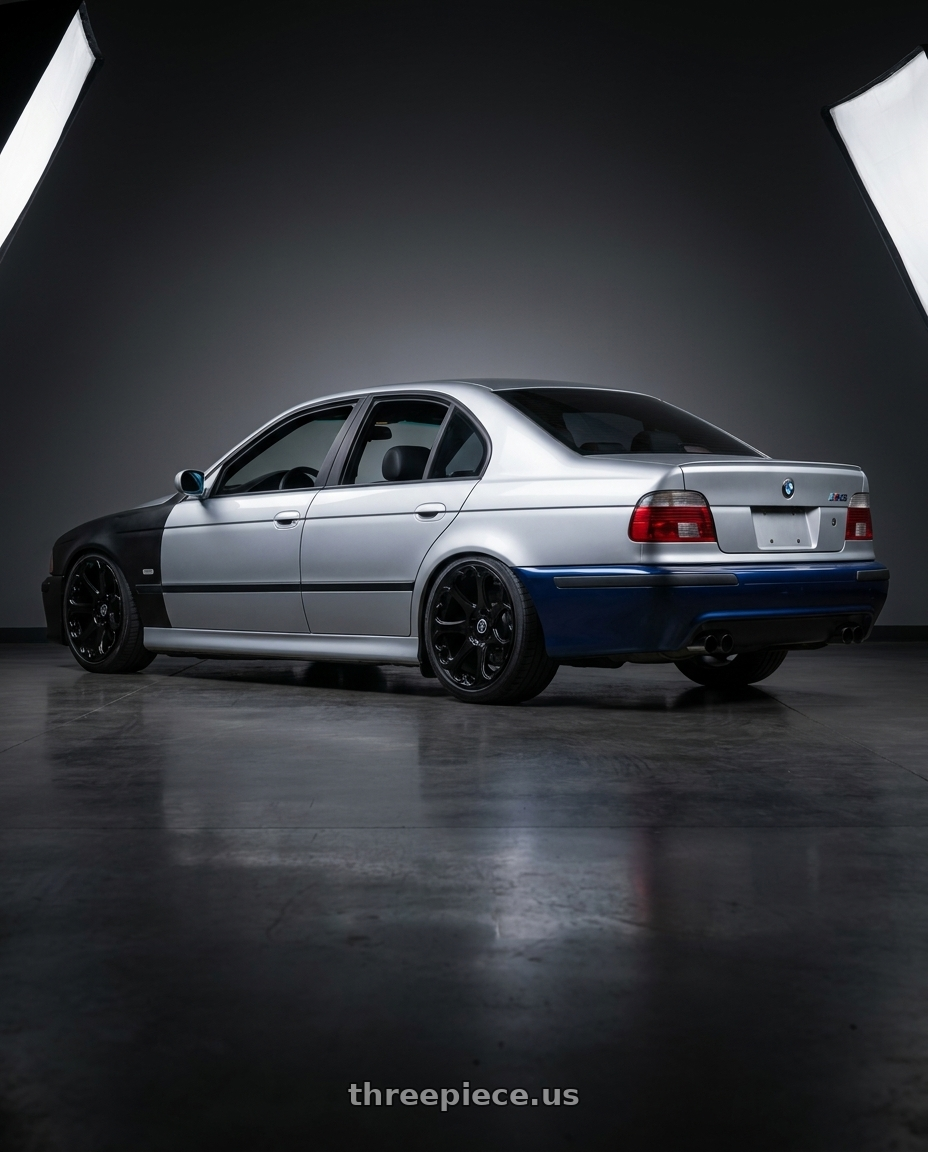 2003 BMW M5 with HERITAGE WHEEL KOKORO MONOC 5x120 17x8 +25 BLACK wheels rear three quarter view slight stretch tires