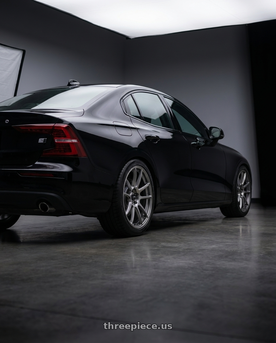 2022 Volvo s60 with Konig Heliogram 5X108 18x8.5+42 Titanium Metallic Knurled Bead Flow Formed wheels rear three quarter view square tires