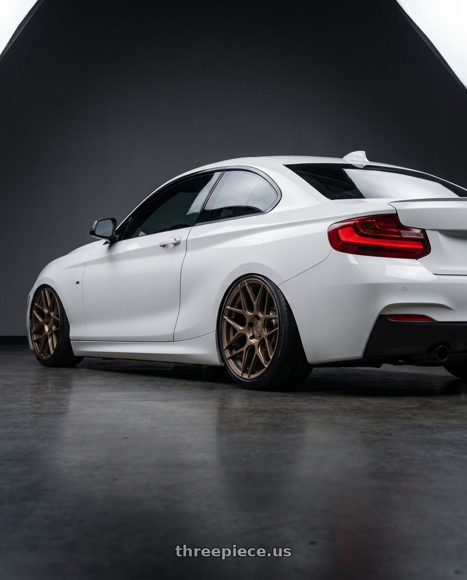 2018 BMW 2 Series F22 with Aodhan AFF2 5x120 19x8.5+35 Matte Bronze wheels rear three quarter view slight stretch tires