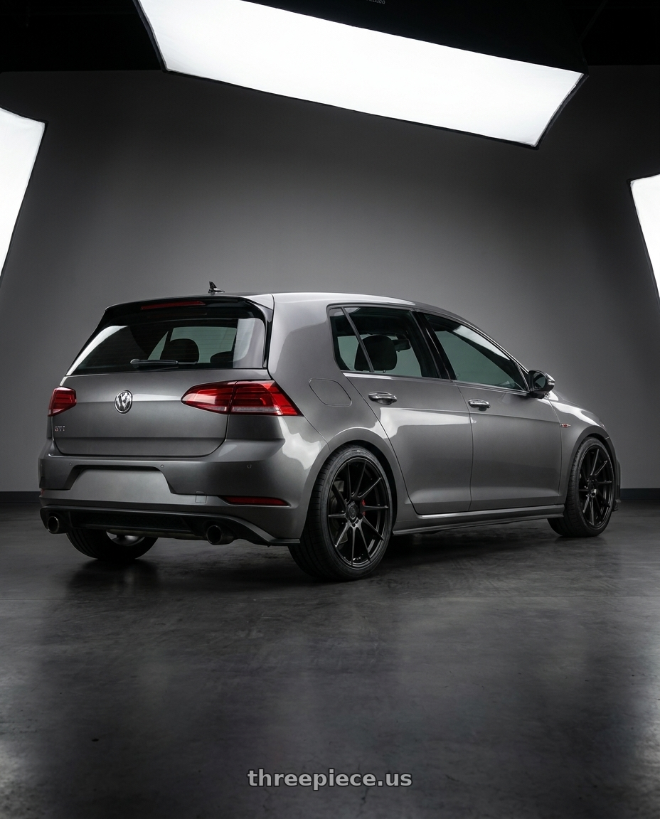 2019 Volkswagen GTI MK7 with Aodhan AH09 5x112 18x9.5 +35 Matte Black wheels rear three quarter view square tires