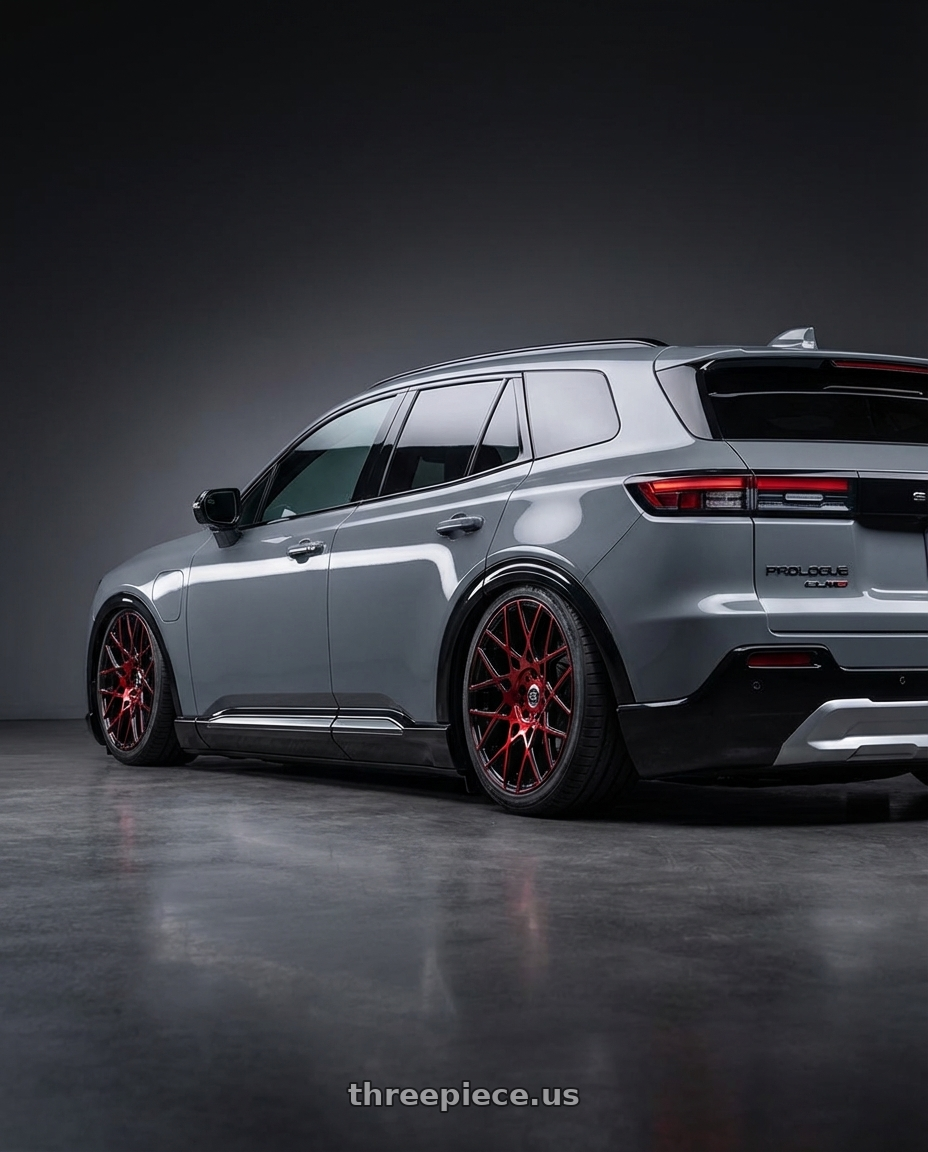 2025 honda prolouge elite grey with Spec-1 SP-52 4x100/4x114.3 17x7.5 +42 Gloss Black & Red Machined wheels rear three quarter view slight stretch tires