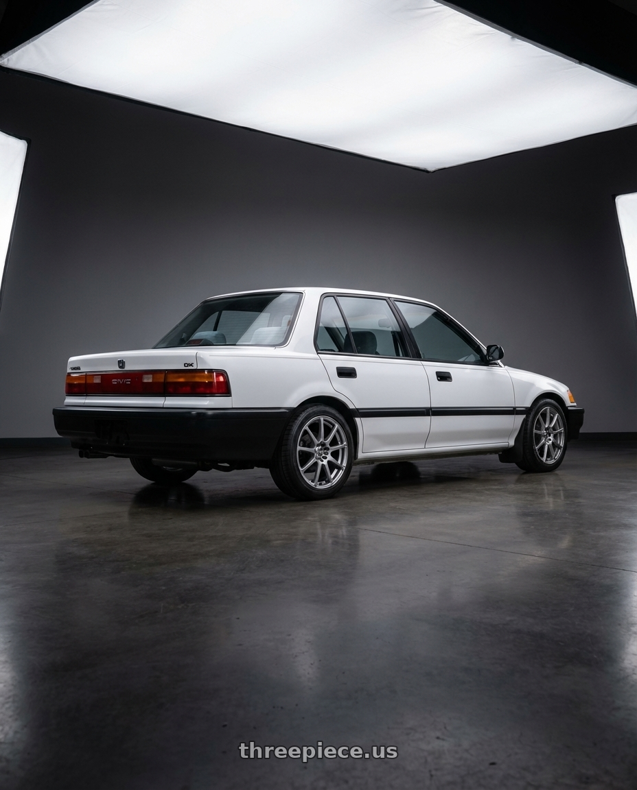 1988 Honda Civic DX, White with Enkei EDR9 4x100/114.3 15x6.5+38 Silver wheels rear three quarter view square tires