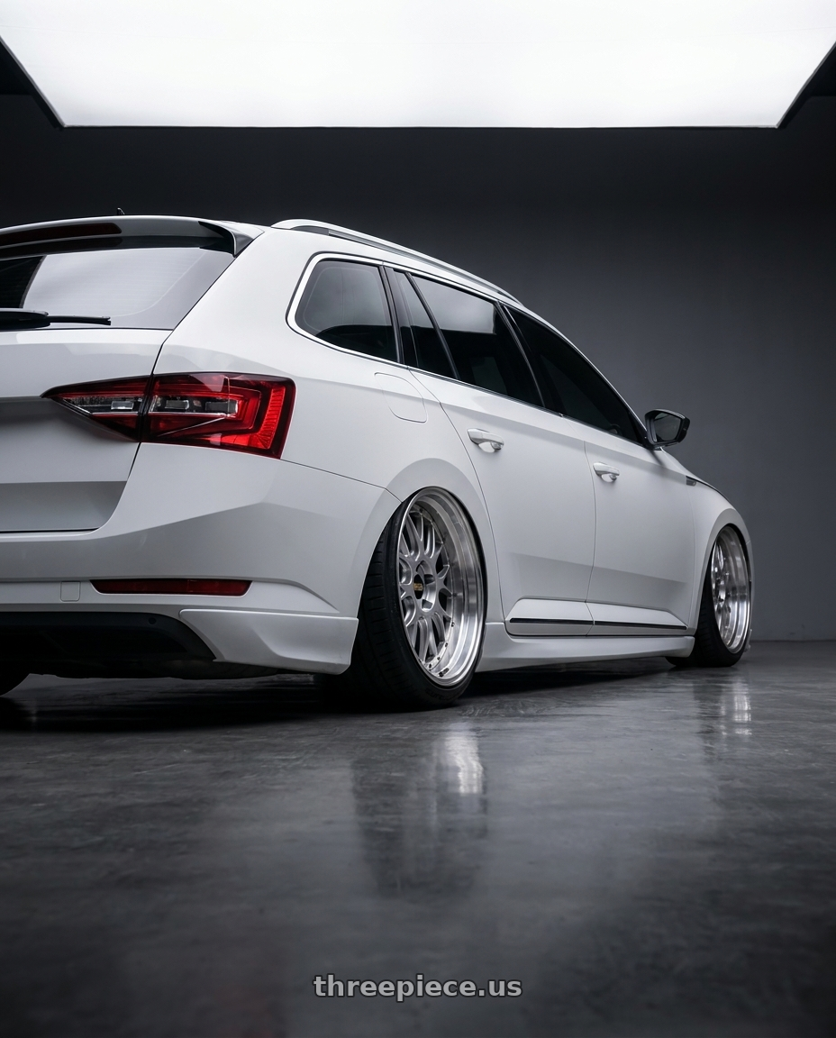 2019 superb combi with BBS LM-R 5x114.3 19x9.5+25 Diamond Silver wheels rear three quarter view slight stretch tires