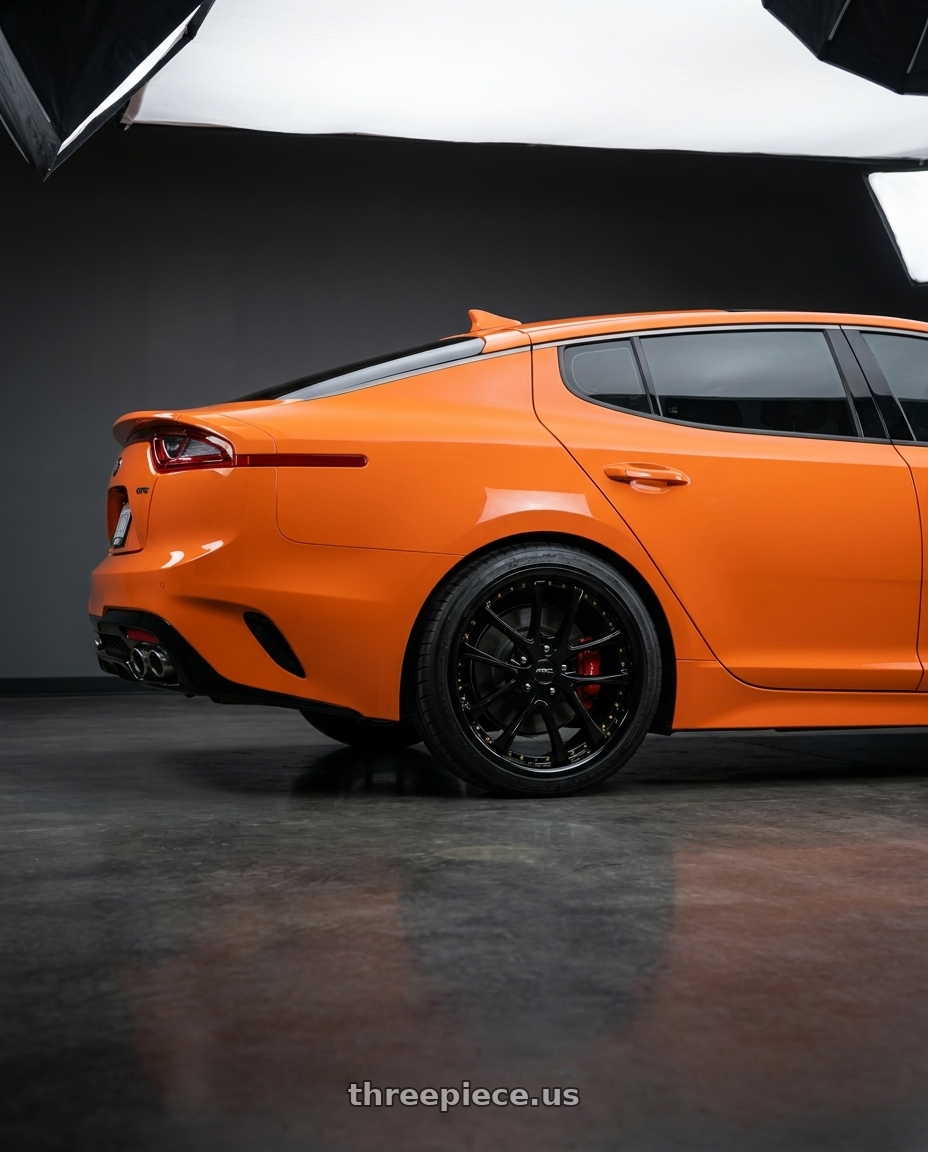 2019 KIA stinger gts  with Vors AR5 5x114.3 19x8.5 +35 All Black Gold Rivet wheels rear three quarter view square tires