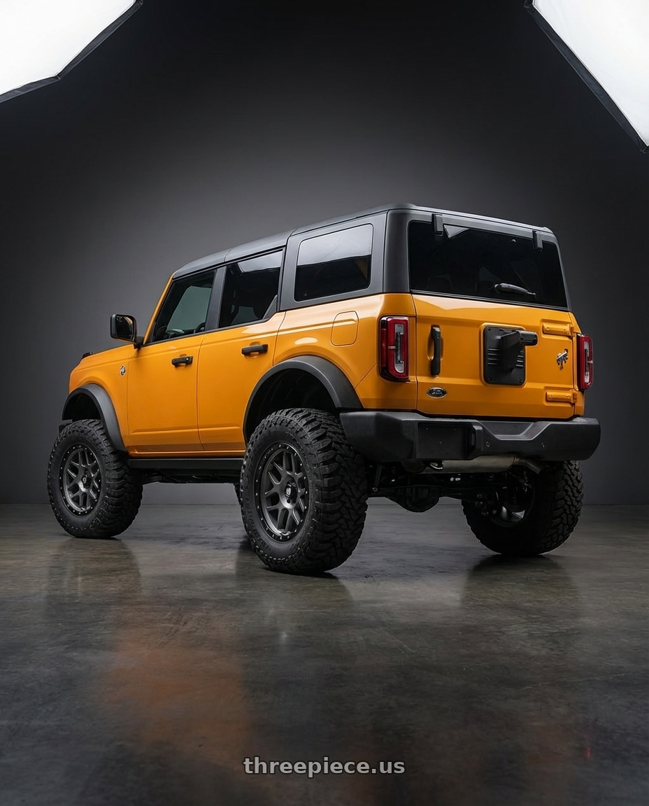 2024 Ford Bronco with XD XD127 BULLY 6X139.7 20X9 +0 MATTE GRAY BLACK RING wheels rear three quarter view meaty tires