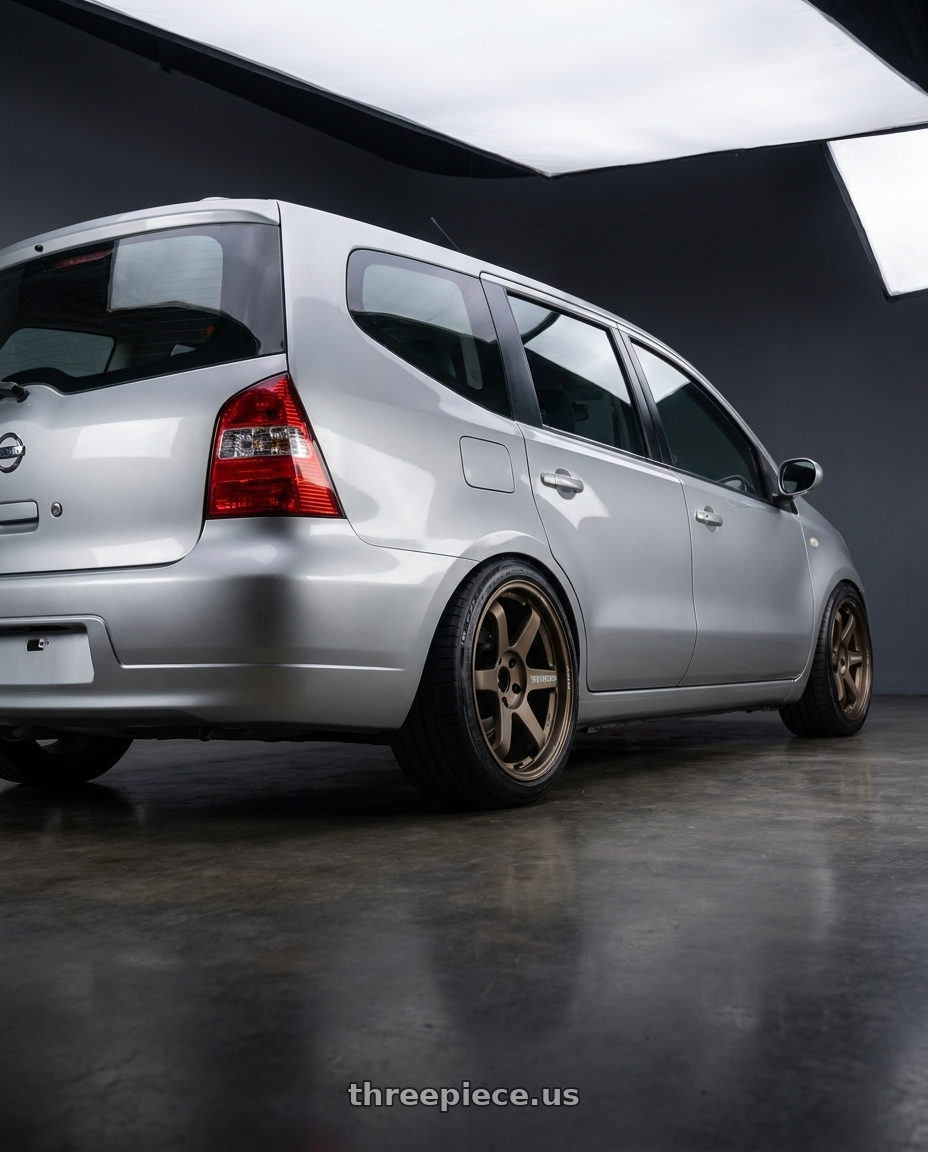 2009 Nissan livina with Volk Racing TE37 Ultra M Spec 5x112 19x9.5+23 19x10.5+35 Bronze Almite Toyota Supra MK5 Spec wheels rear three quarter view square tires