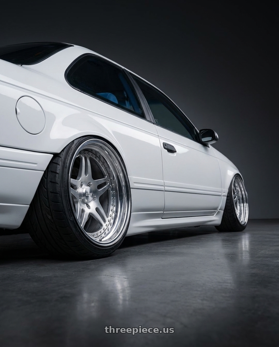 1993 Ford Taurus with CCW SA52 5x108 17x8 +35 Polished wheels rear three quarter view extreme stretch tires