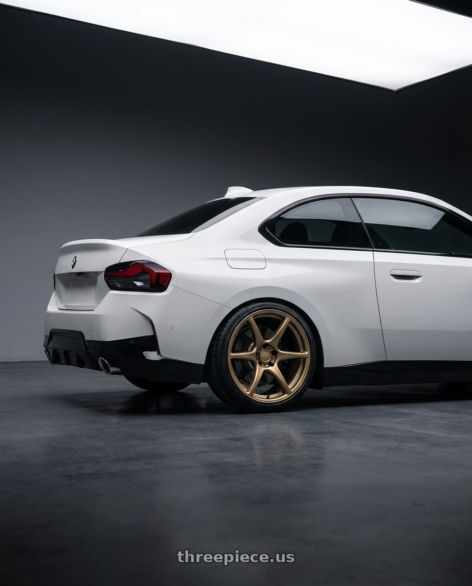 2024 BMW 2 Series G42 with Kansei K11B Tandem 5X112 19x9.5 22 Bronze wheels rear three quarter view square tires