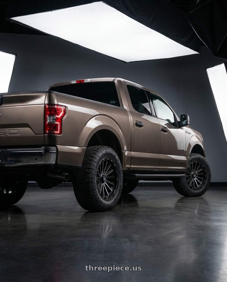 2019 Ford F-150 with KMC KM102 SIGNAL 6X135/6X139.7 20X9 +0 SATIN BLACK WITH GRAY TINT wheels rear three quarter view meaty tires
