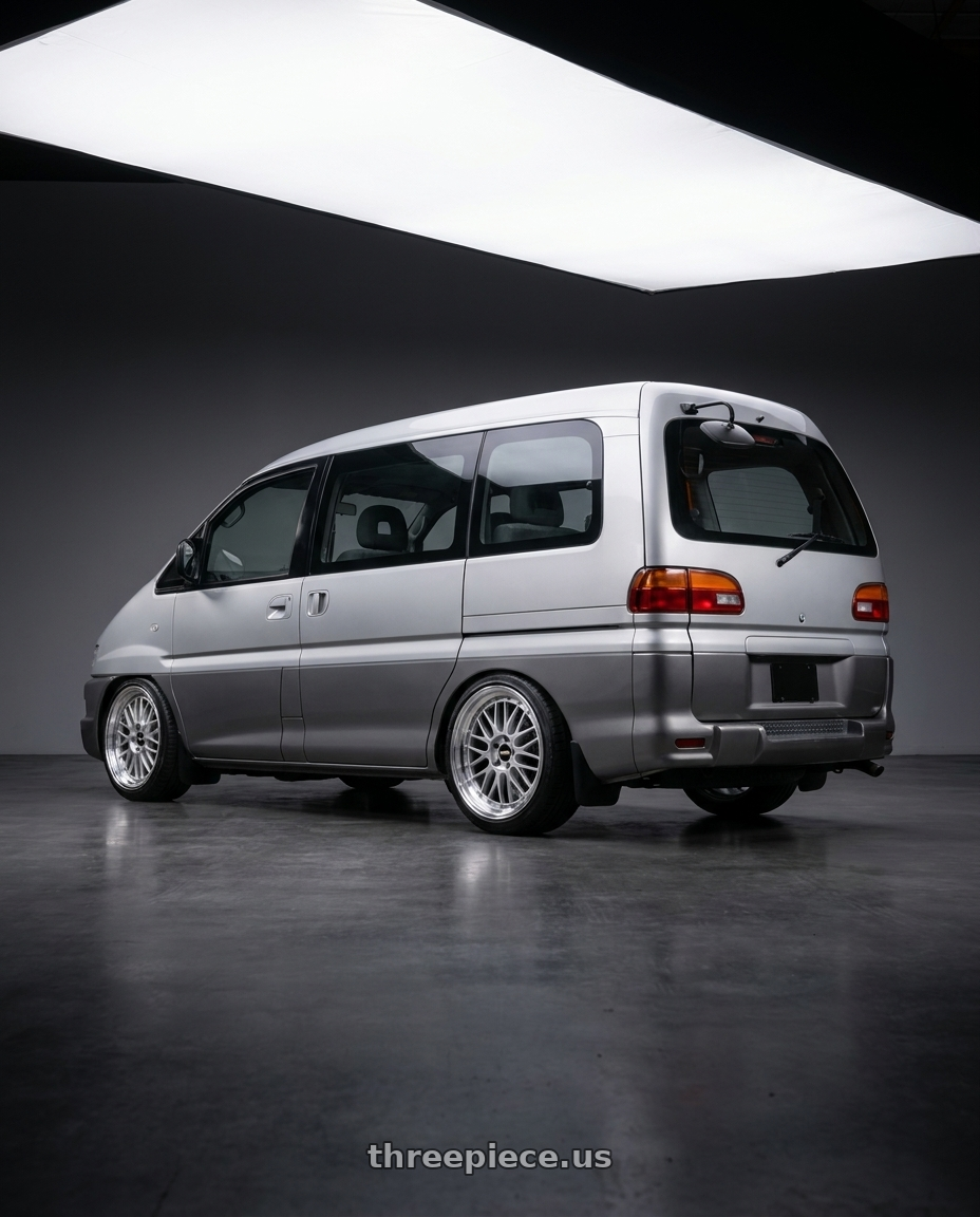 2006 mitsubishi Delica L400 with BBS LM 5x114.3 18x8.5+38 Diamond Silver wheels rear three quarter view slight stretch tires