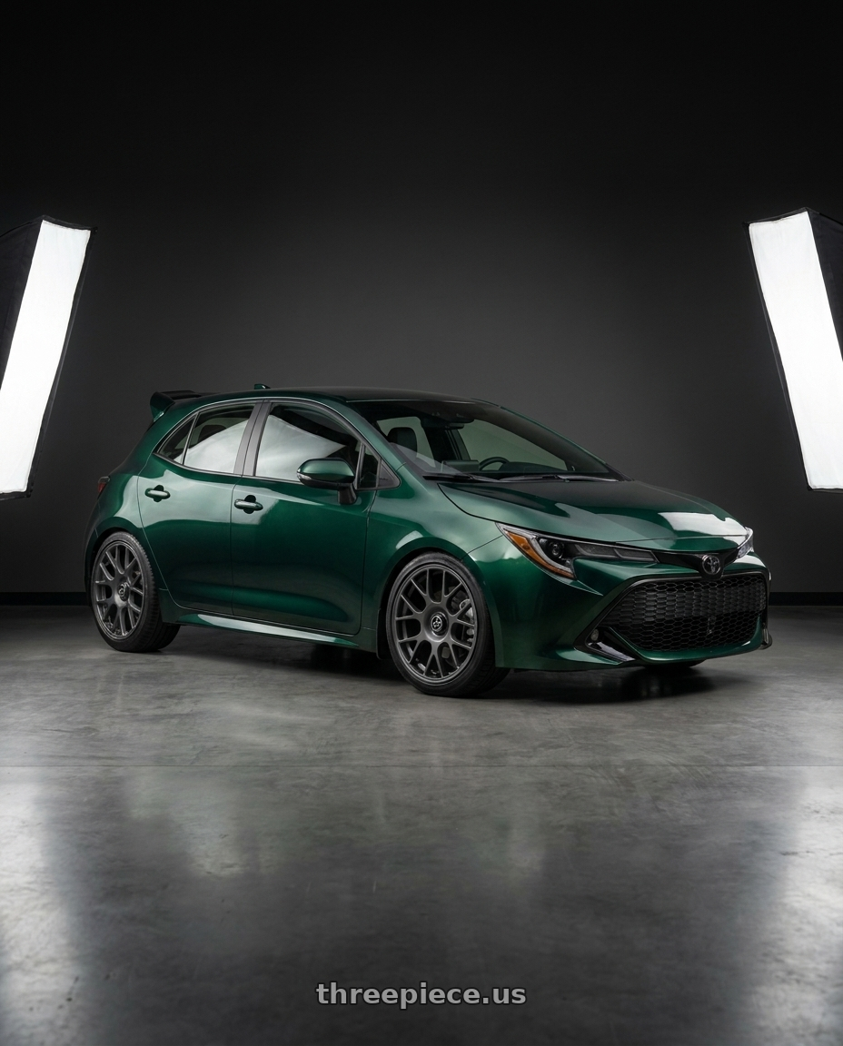 2019 Corolla Hatch Se With Spoiler Wrapped Dark Emerald Green with fifteen52 APEX 5x100 / 5x114.3 18x8.5 +35 FROSTED GRAPHITE (SATIN GREY) wheels