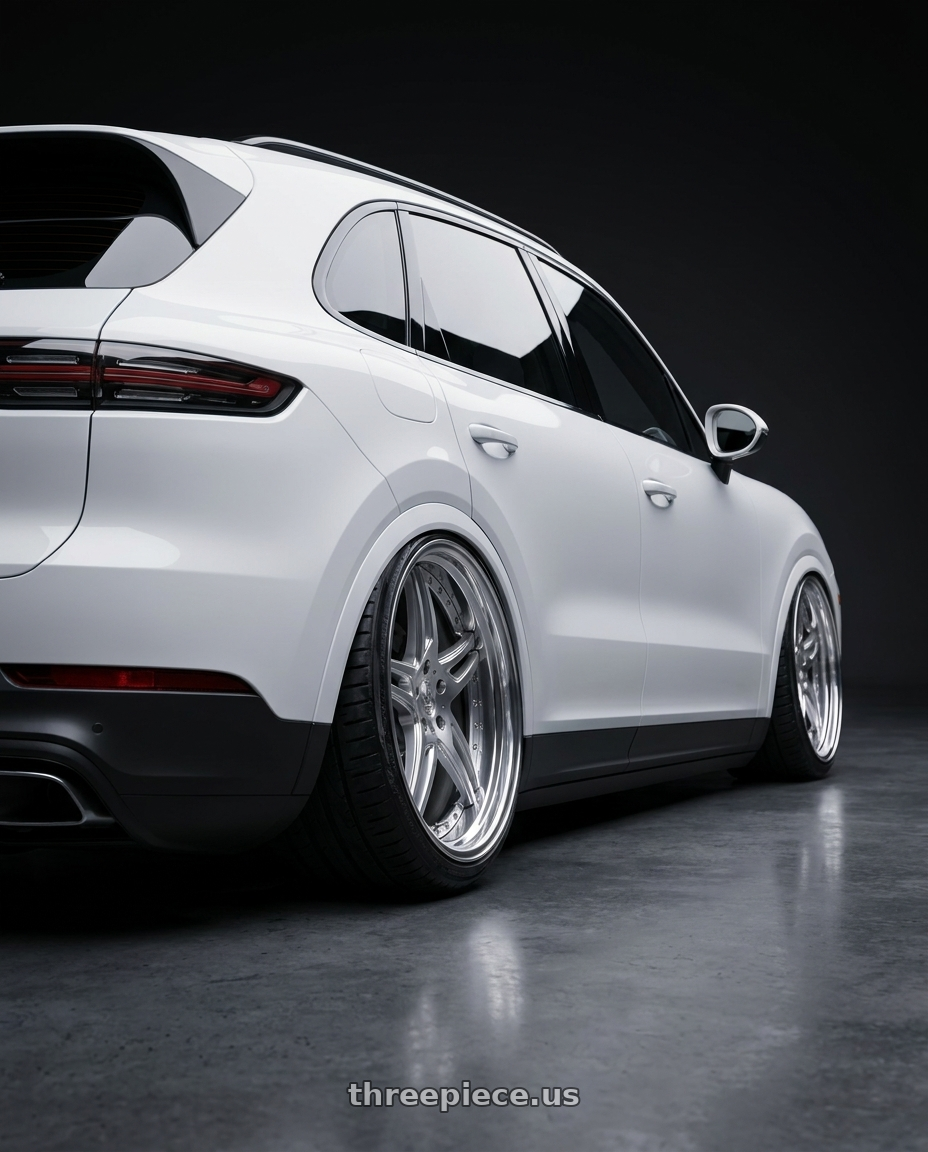 2019 porsche cayenne with DURANDAL DD5.2 SILVER POLISHED 5x100 19x10.5 +84MM wheels rear three quarter view extreme stretch tires