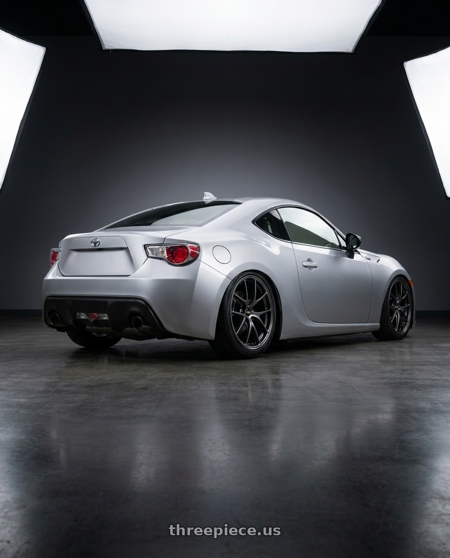 2012 Toyota 86 with BBS RI-A 5x120 18x9.5+23 Diamond Black wheels rear three quarter view slight stretch tires