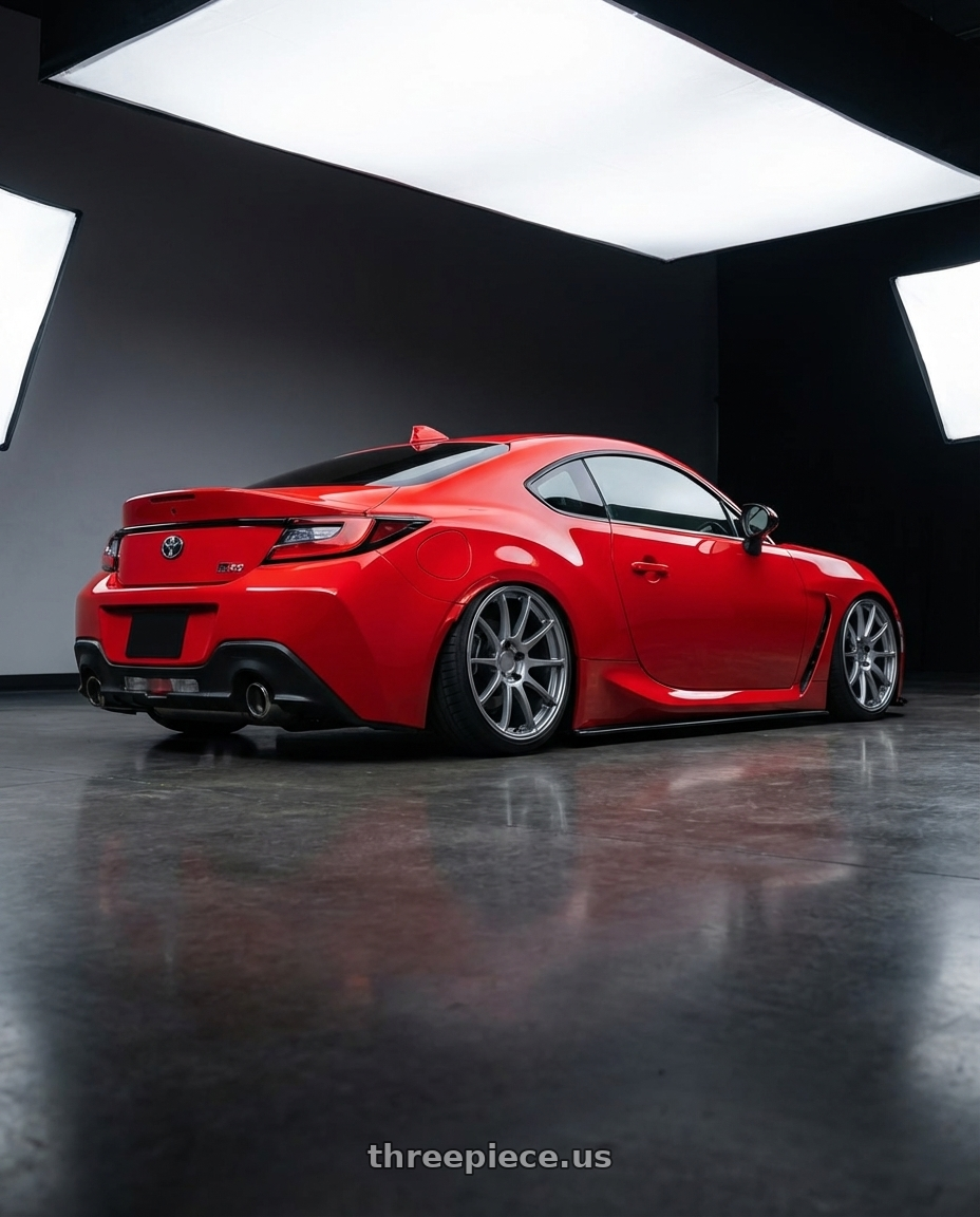 2024 Toyota GR86 with Ssr Gtv02 5x114.3 18x7.5+43  GLARE SILVER wheels rear three quarter view slight stretch tires