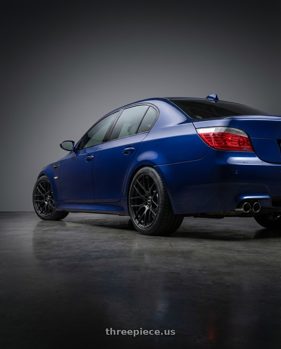 2010 BMW M5 E60 with Avant Garde Wheels M359 5X120 19x9 +18 Matte Black wheels rear three quarter view square tires