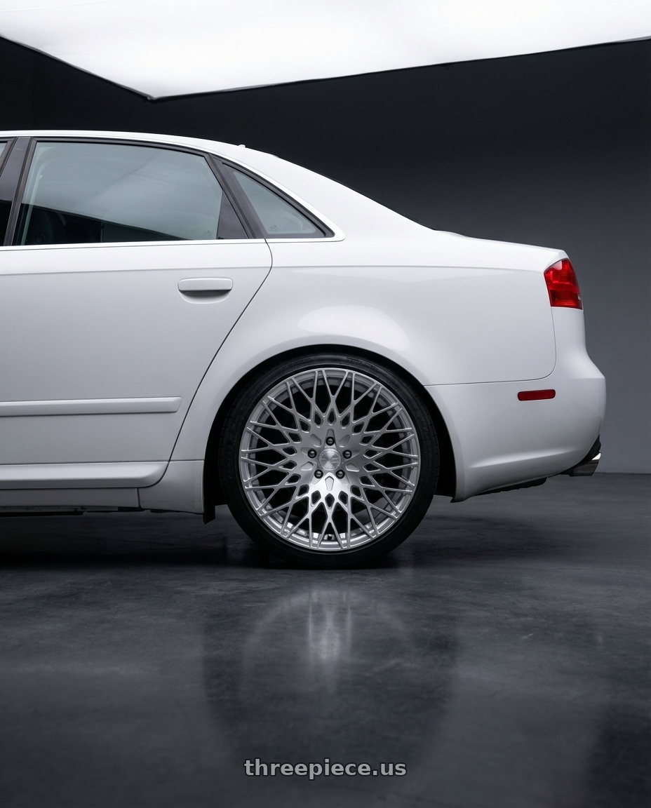 2010 Audi A4 B7 with Avant Garde Wheels M540 5X112 18x9 +48 Silver Machined wheels rear three quarter view square tires