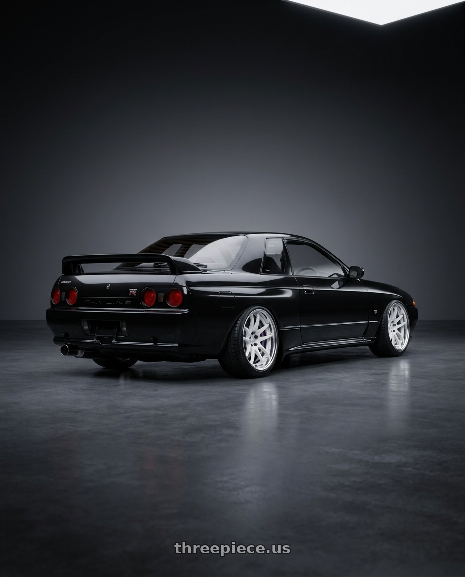 1990 nissan skyline with Work Cr 2P 4x100 17x10.5 +38 Gloss White wheels rear three quarter view slight stretch tires