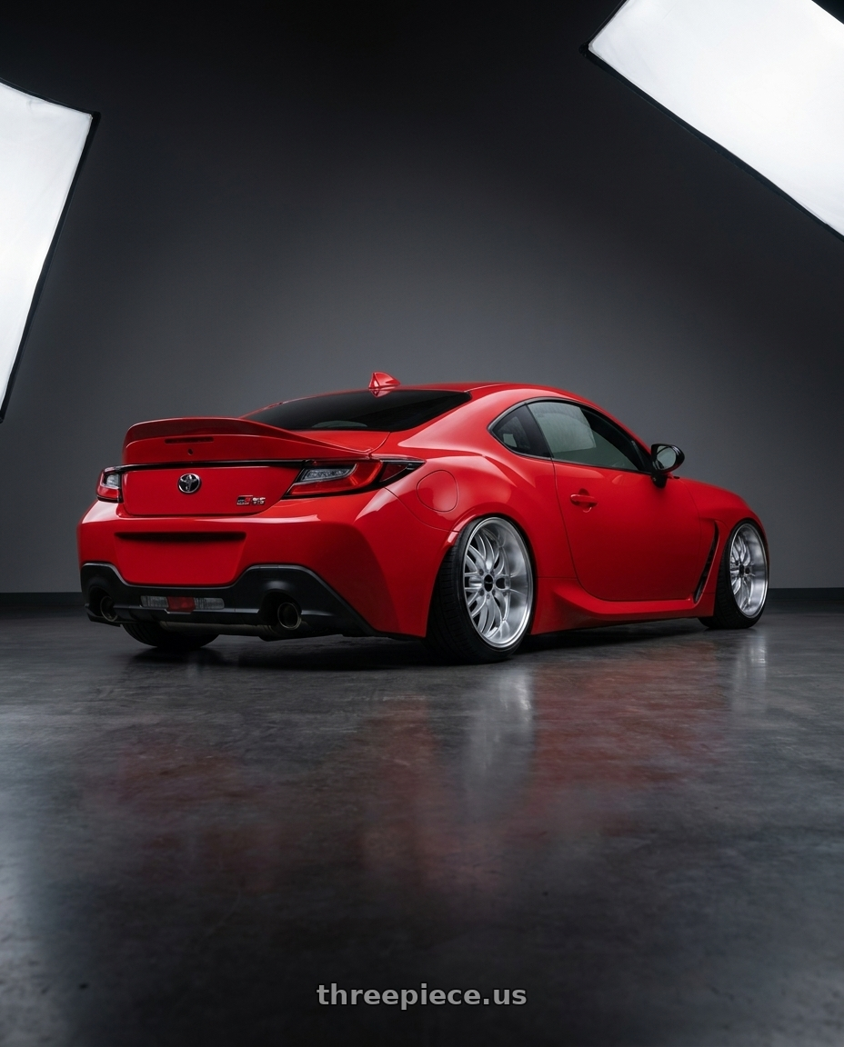 2022 Toyota gr86 with ARC AR3 4x100 16x8.5  +20 Hyper Silver Machine Lip wheels rear three quarter view slight stretch tires