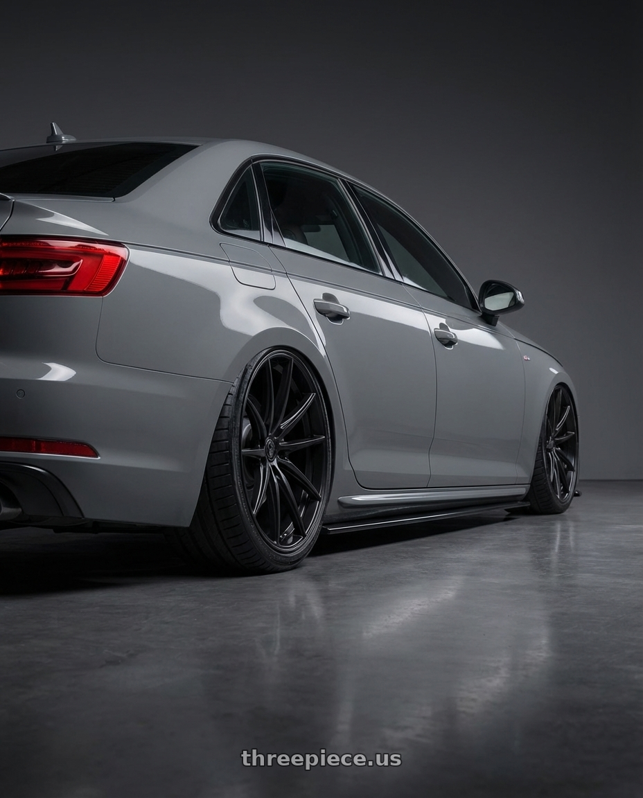 2023 Audi S4 B9 with Konig Oversteer 5x112 20x8.5+42 Gloss Black wheels rear three quarter view slight stretch tires