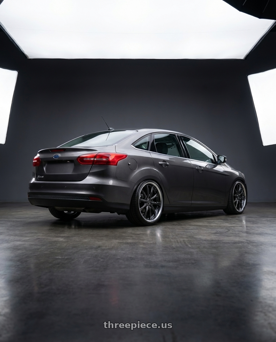 2018 Ford Focus with Work Schwert Quell 5x114.3 19x7.5+45 A Disk Brilliant Silver Black wheels rear three quarter view square tires