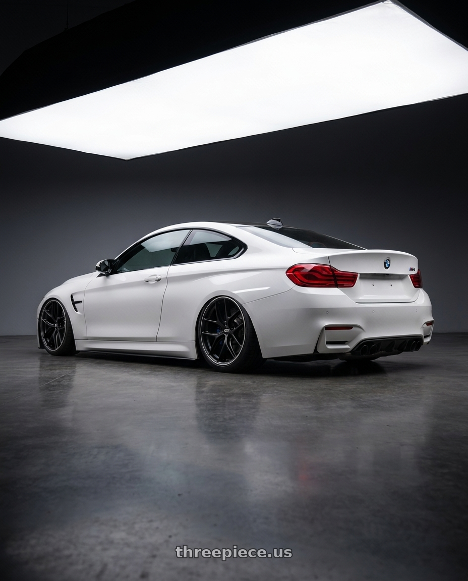 2018 BMW M4 F82 with BBS CC-R 5x120 19x9.0+26 Satin Black wheels rear three quarter view slight stretch tires