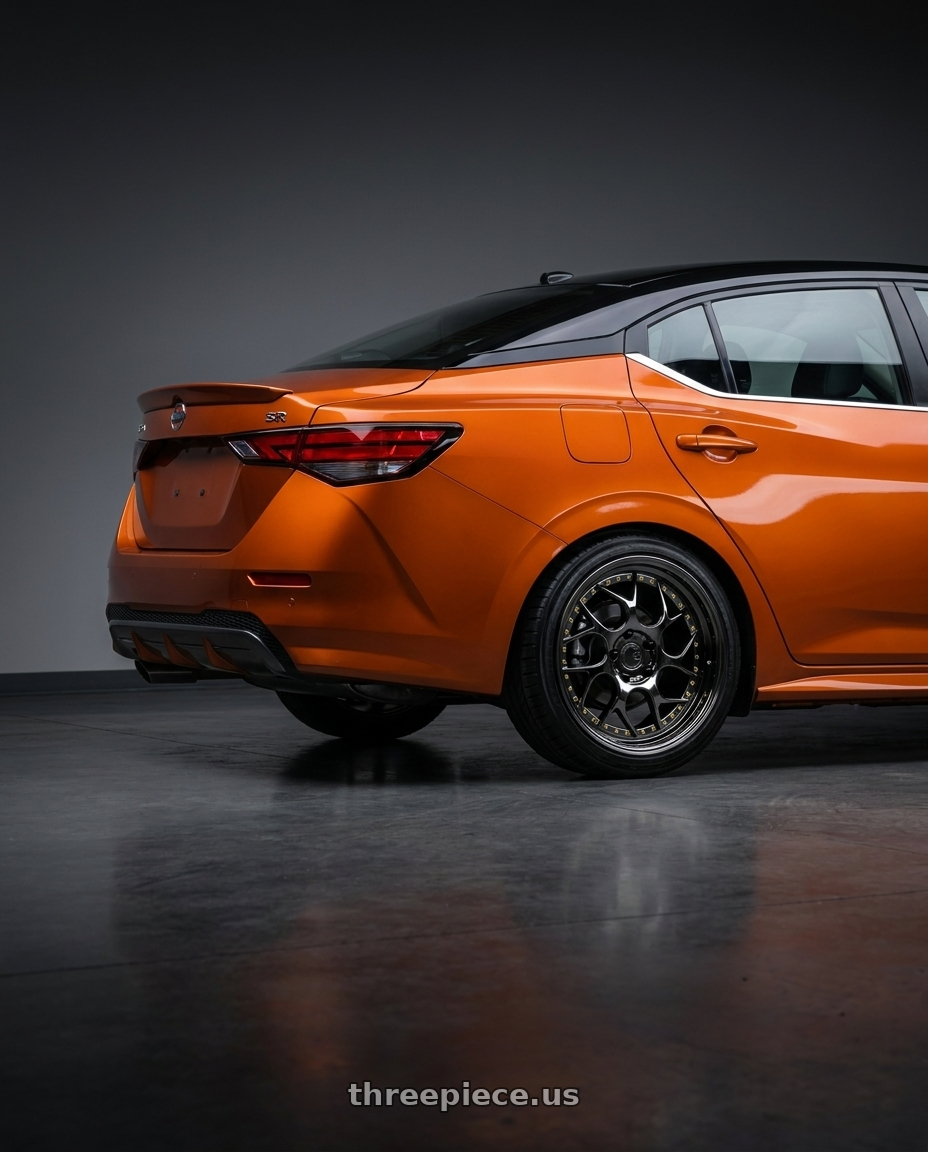 2024 nissan sentra sr premium  with Aodhan DS01 5x114.3 18x8.5+35 Black Vacuum W/ Gold Rivets wheels rear three quarter view square tires