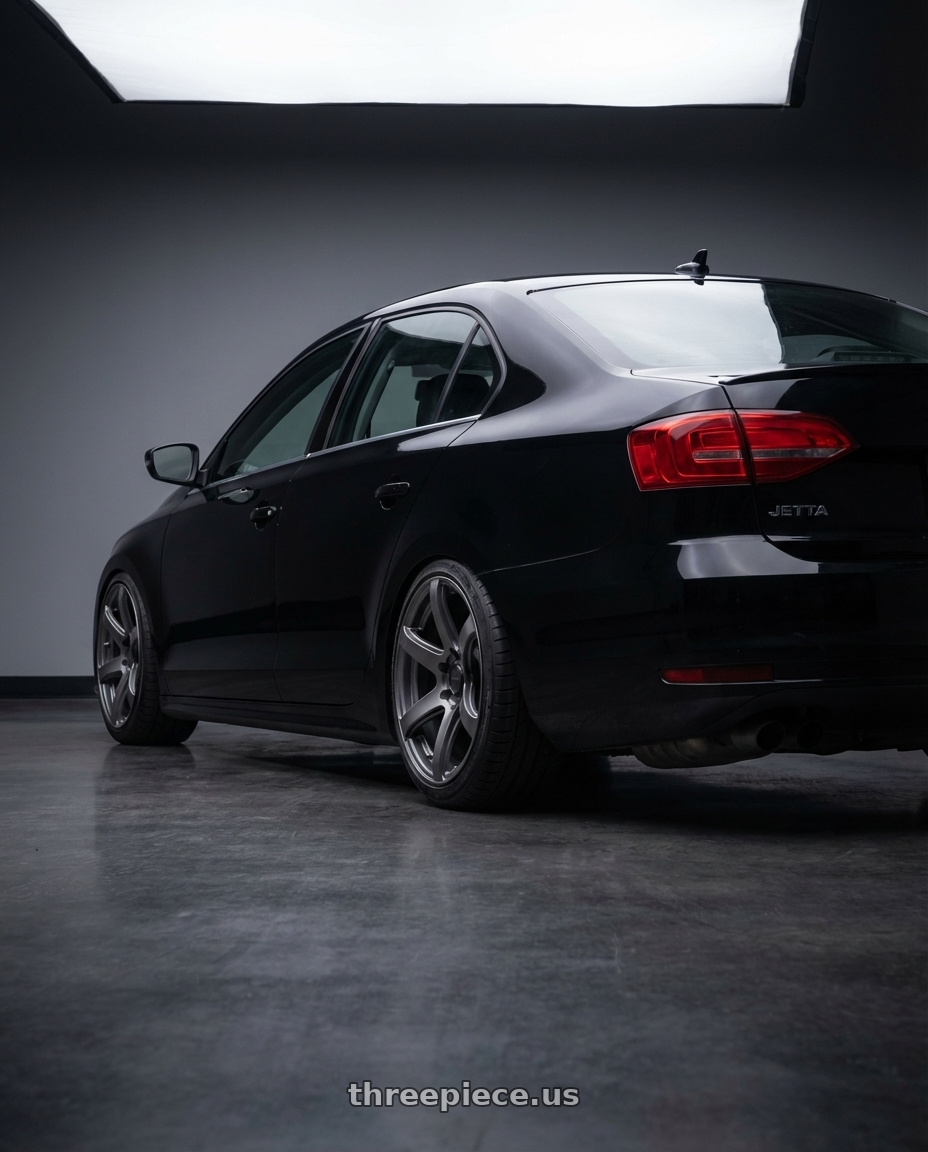 2013 Jetta TSI mk6  with Enkei Cyclone 6x139.7 18x9+0 Matte Gunmetal wheels rear three quarter view square tires