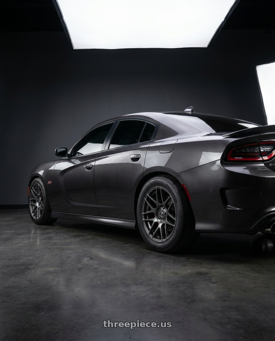 2016 dodge charger srt with Forgestar F14 Drag 5x120 17x10 +44 Gloss Anthracite wheels rear three quarter view meaty tires