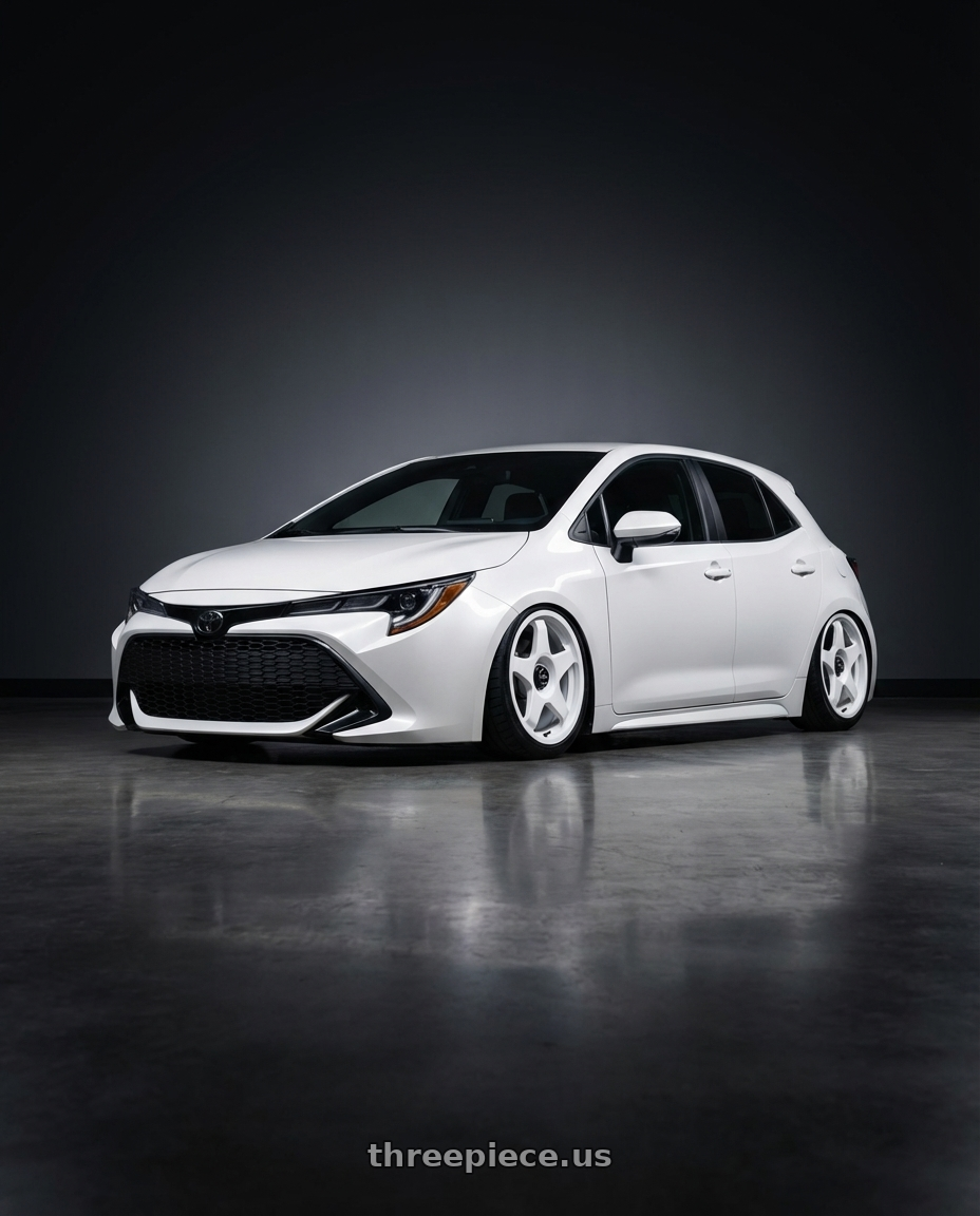 2023 Toyota Corolla Hatchback with fifteen52 CHICANE 5x114.3 / 5x100 18x8.5 +35 RALLY WHITE (GLOSS WHITE) wheels