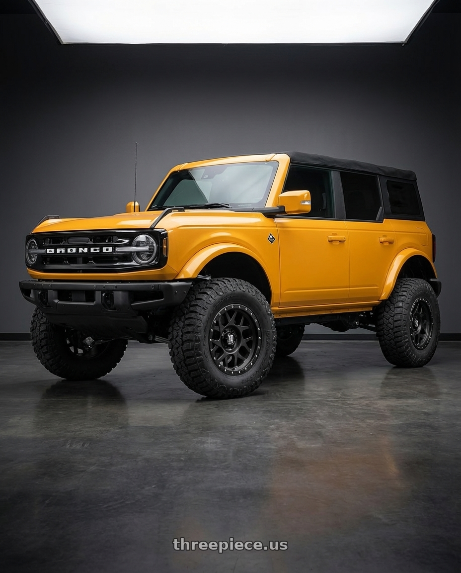 2024 Ford Bronco with XD XD127 BULLY 6X139.7 20X9 +18 SATIN BLACK WITH REINFORCING RING wheels front three quarter view lifted stance