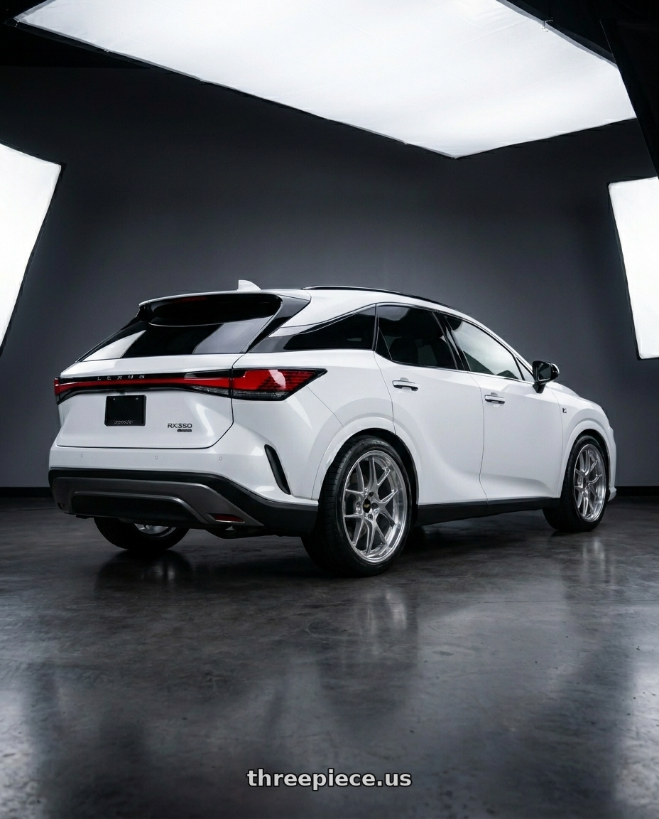 2023 Lexus rx350 with BBS LM 5x120 21x10.0+38 Diamond Silver wheels rear three quarter view square tires