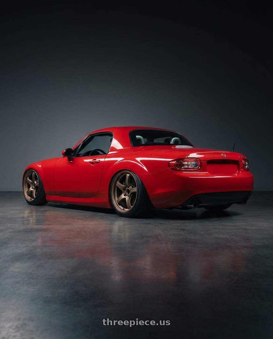 2012 Mazda MX-5 Miata NC with Gram Lights 57CR 5x114.3 17x9+22 Bronze II wheels rear three quarter view slight stretch tires