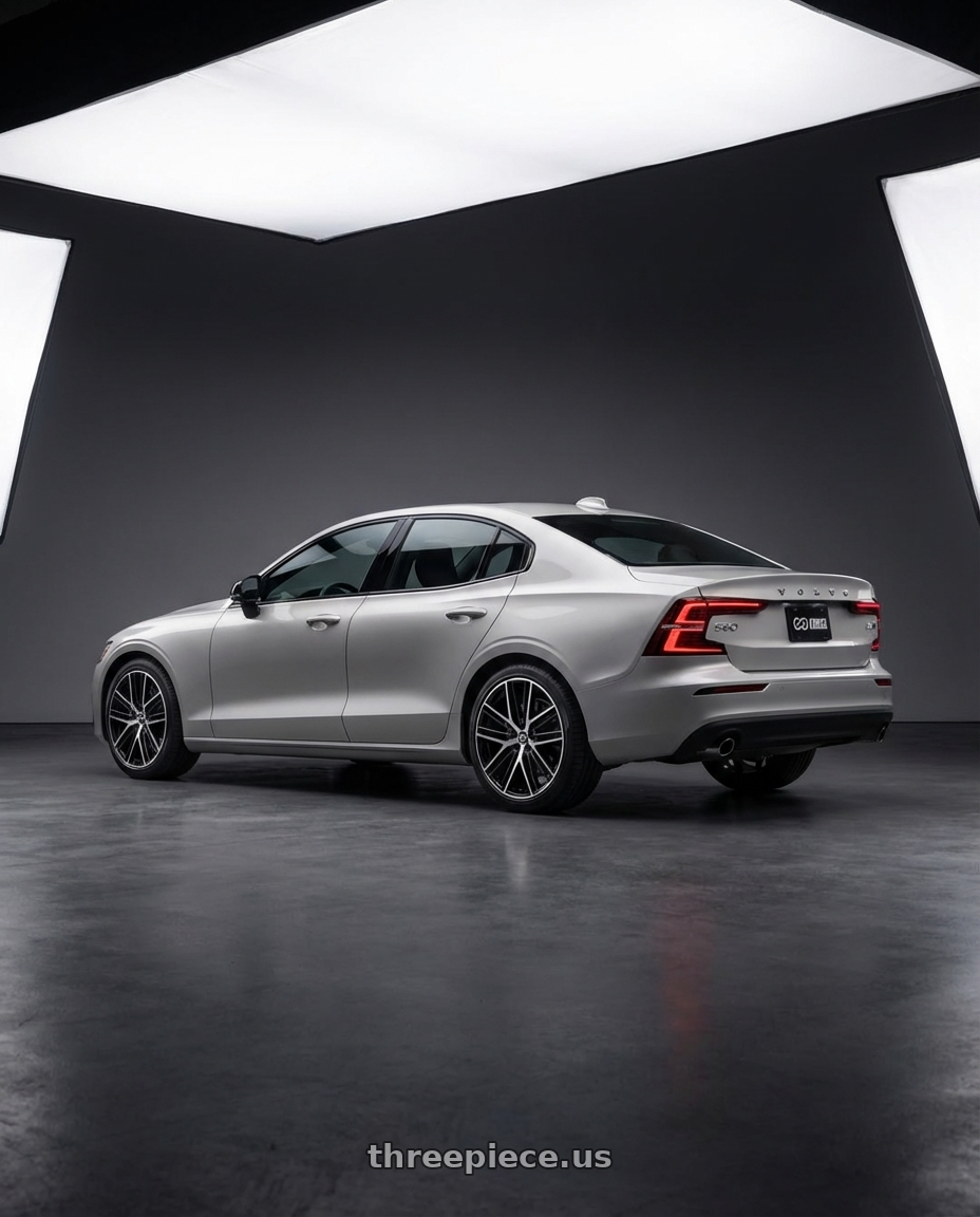 2024 Volvo S60  Silver Dawn with Enkei Phantom 5x108 18x8+40 Black Machine wheels rear three quarter view square tires